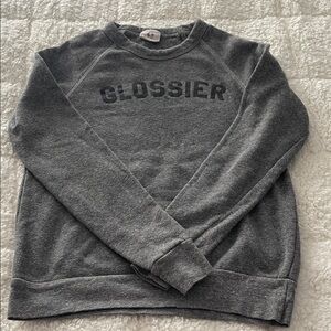 Glossier grey sweatshirt in size XS with distressed finish with crew neck.